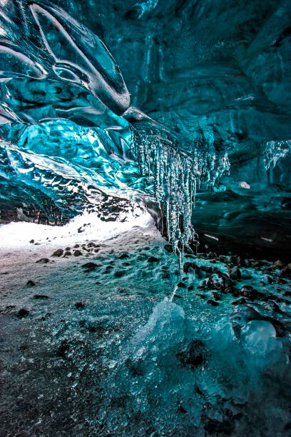 istock Stalactite formation inside an ice cave in Vatnajokull glacier, Iceland 1299130845
