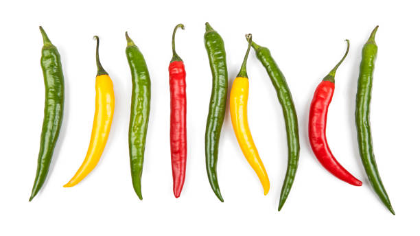 istock Small peppers isolated on a white background. View from another angle in the portfolio. 1299130859