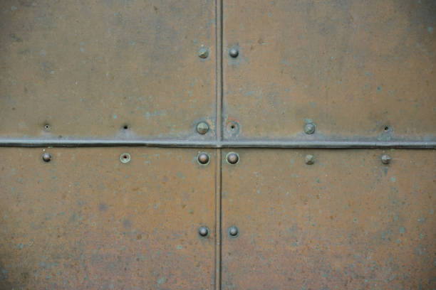 istock Background divided into four parts made from a copper plate that has been weathered 1299131062