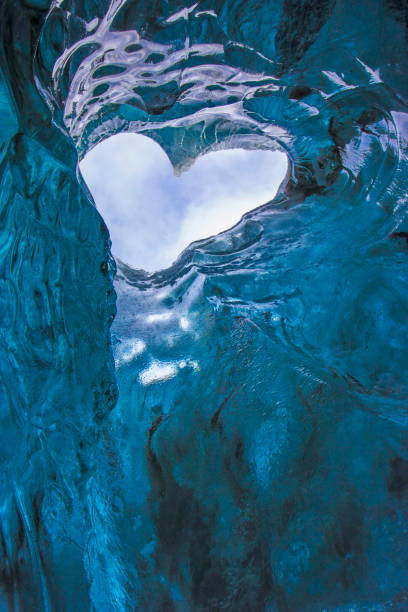 istock Perfect heart formation inside an ice cave in Vatnajokull glacier, Iceland 1299131843