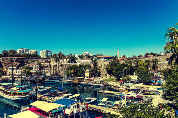 istock View to the city port, boats and empty blue sky 1299132247
