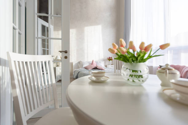 istock Luxurious and expensive interior of an open-plan apartment in light colors. 1299134394