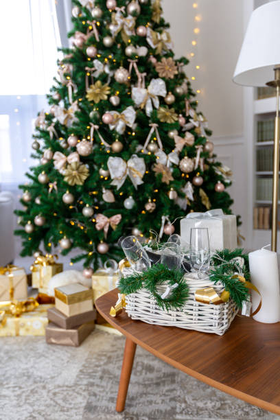 istock Luxury rich expensive apartment interior in light colors. Stylish contemporary minimalistic design. Full of sun light. A lot of space decorated with Christmas tree 1299134419