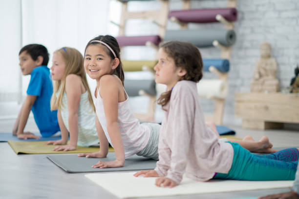 istock Stretching my body during yoga class 1299135561