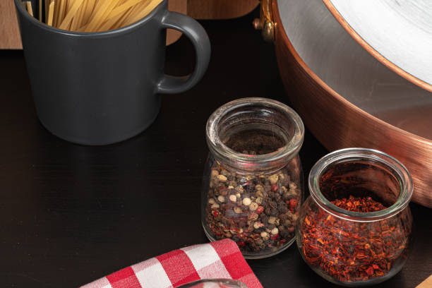 istock Set of spices on a kitchen counter close up 1299135574