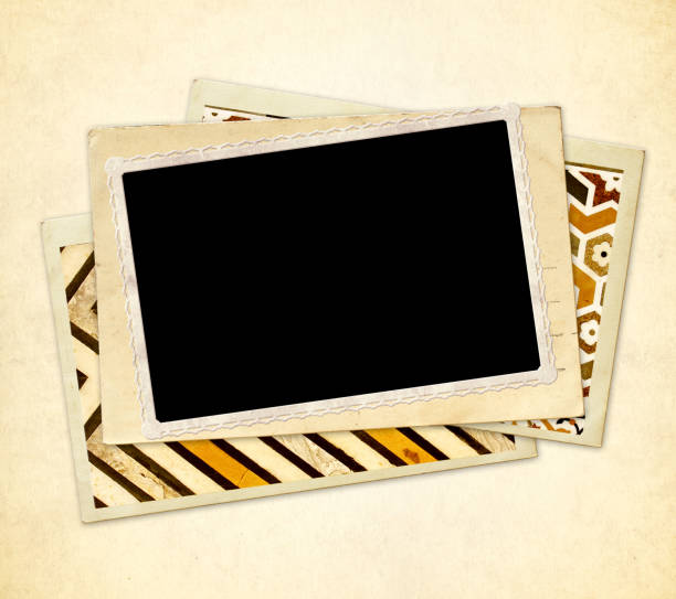 istock Vintage background with post cards and blank photo 1299136857