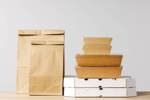 istock Assortment of various food delivery containers on table 1299136888