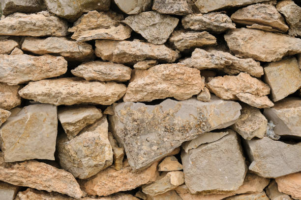 istock Background texture of stone and rock wall 1299138145
