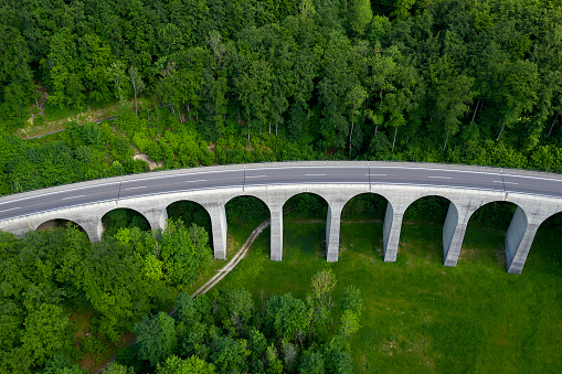 Highway arch bridge without car traffic viewed from above, coronavirus effect, Germany.