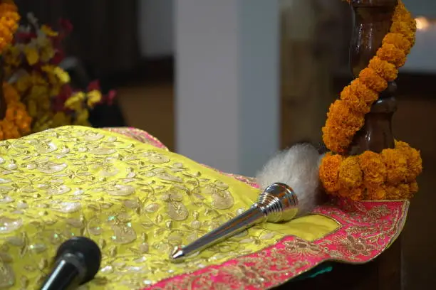 Chaur sahib for Guru Granth sahib. Sikh Religion ritual worship Chaur sahib in holy Gurudwara.
