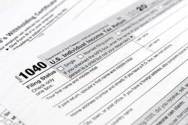 istock Tax forms 1040. Close up. Financial background. 1299143917