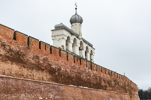 Orthodox chapel with white domes on the territory of the ancient Novgorod Kremlin.