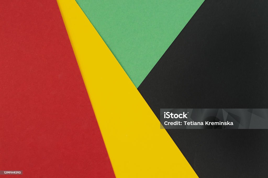 February Black History Month. Abstract Paper geometric black, red, yellow, green background. Copy space, place for your text. February Black History Month. Abstract Paper geometric black, red, yellow, green background. Copy space, place for your text. Top view. Black History Month Stock Photo