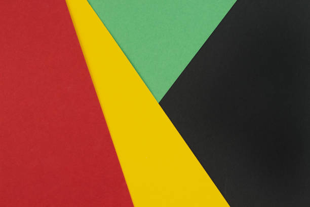 February Black History Month. Abstract Paper geometric black, red, yellow, green background. Copy space, place for your text. February Black History Month. Abstract Paper geometric black, red, yellow, green background. Copy space, place for your text. Top view. black history stock pictures, royalty-free photos & images
