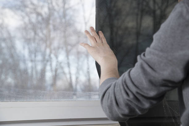 istock Installation of window film in the office. 1299149501