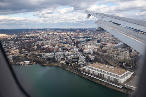 Washington D.C., USA - January 17, 2021: Aerial view of the Watergate complex and the John F. Kennedy Center for the Performing Arts.