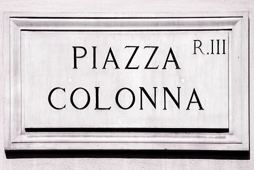 Street sign the Piazza Colonna in Rome - Italy.