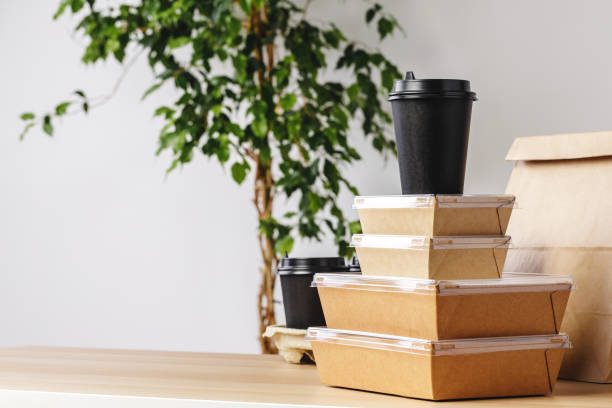 istock Assortment of various food delivery containers on table 1299157403