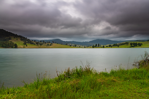 Hilly countryside and Lostock Dam in the Upper Hunter Region of NSW, Australia.