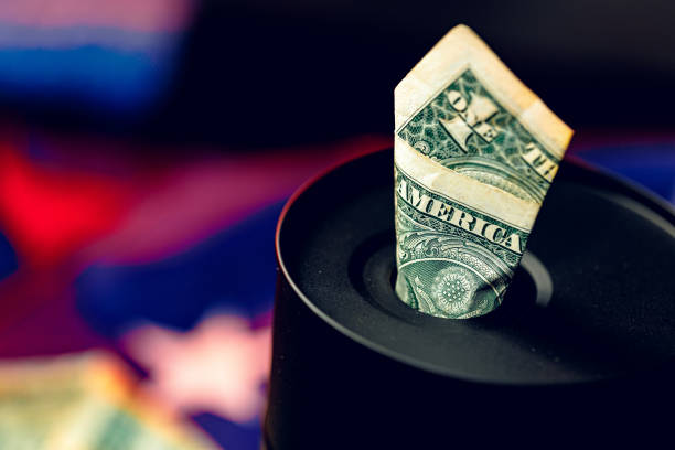 istock Oil industry crisis concept. Oil barrel with american dollar 1299166350