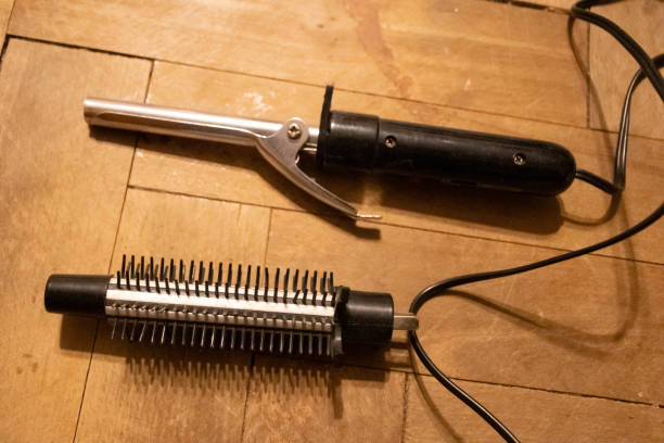 istock branded hair curler machine close up 1299170036