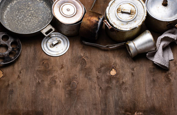 istock Old vintage iron pots and metallic dish 1299171068