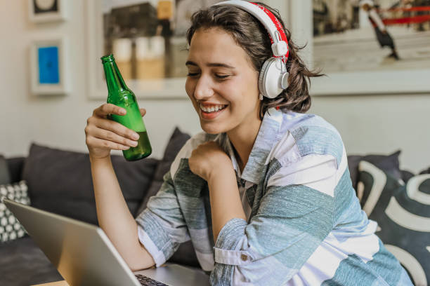 istock Socializing at home via video call 1299172136
