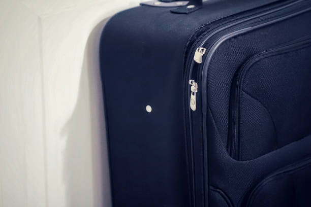 istock A close up image of a suitcase on a white background 1299176764