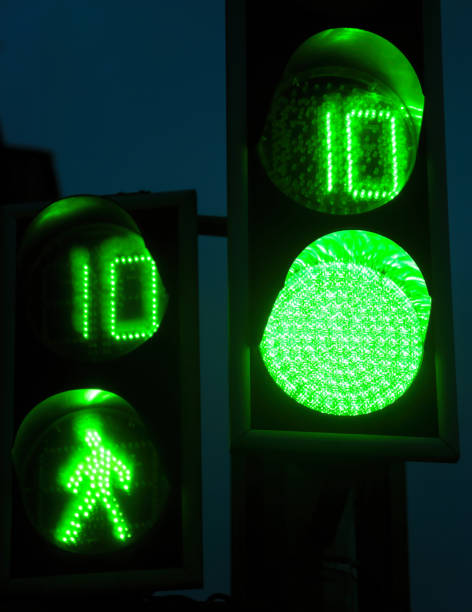istock Green traffic light for pedestrian crossing 1299178401
