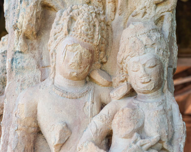 istock White stone couple sculpture in Durga Gudi, Aihole, Karnataka, India 1299179216