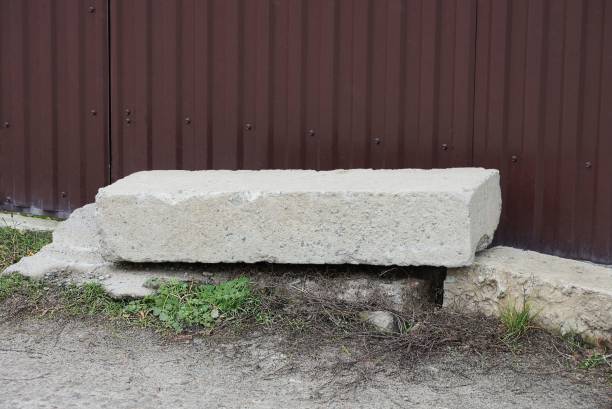 istock a white concrete block lies on gray ground 1299187516