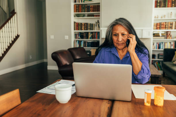 istock Senior Woman on Telemedicine Visit 1299187600