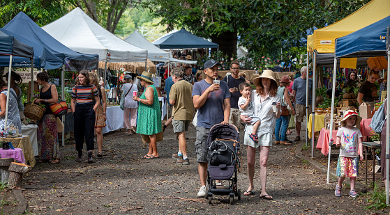 Bellingen, NSW-Dec 19th 2020\nPart of the crowd enjoying the 40th anniversary Bellingen markets, the first in a year of covid.