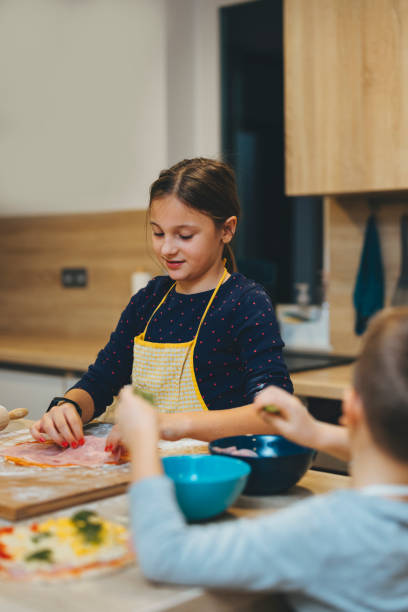 istock Young girl loves cooking in the kitchen 1299189194