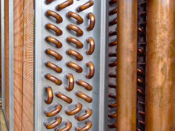 close shot of copper plain tubes of a condenser coil. - condenser imagens e fotografias de stock
