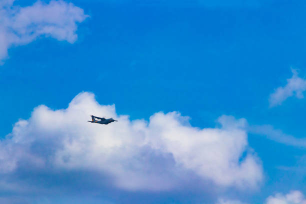 istock Airplane flies above the clouds in Mallorca Spain. 1299191899