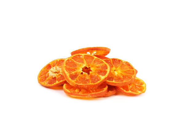istock a bunch of orange chips isolated on a white background close up 1299192143