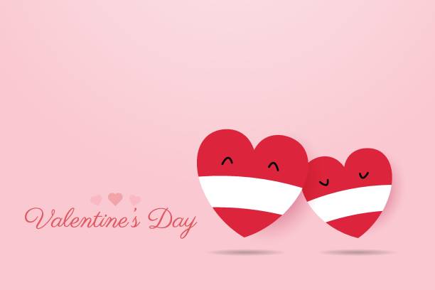 istock Couple's heart wearing a mask Happy valentines day Together to prevent the coronavirus COVID 19 1299207238