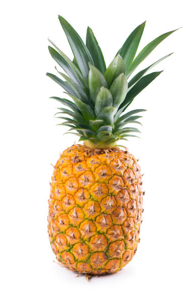 istock Ripe whole pineapple isolated on the white 1299213685