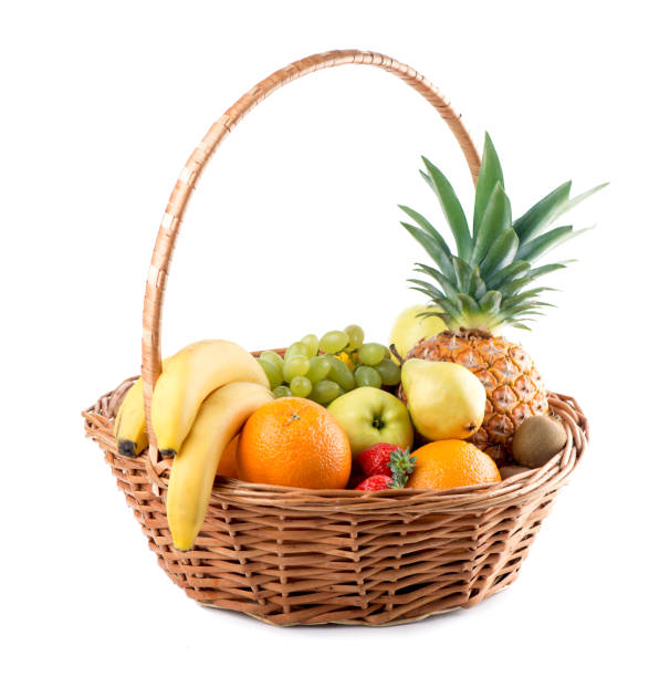 istock Fresh fruit in the basket on white background 1299213692