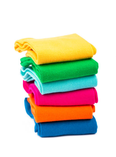 istock Pile of colorful socks on white background 1299213723