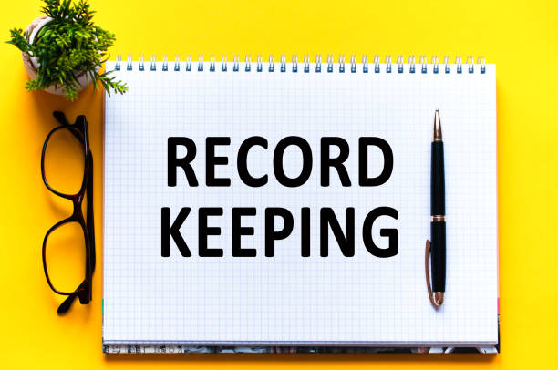 istock Word text RECORD KEEPING on white paper card, business concept 1299218511