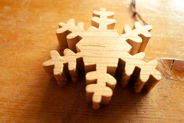 istock Wooden snowflake christmas decoration 1299222300