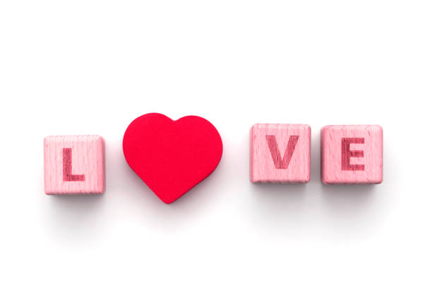 istock Love word with red heart isolated on white, lay out 1299223198
