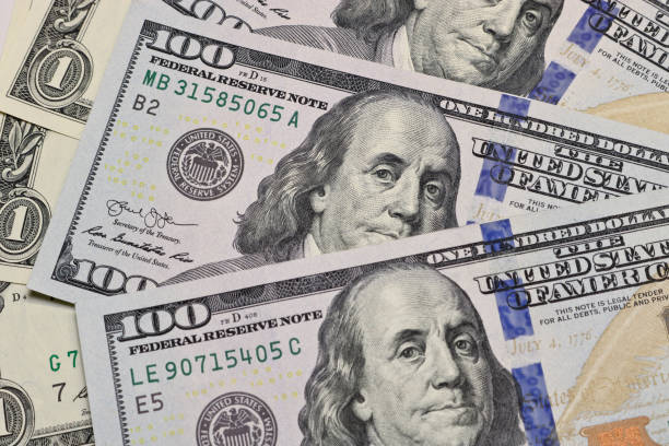 istock Currency American dollars - paper banknotes. Money background. 1299226725