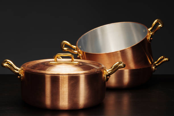 istock Set of copper cookware over dark background 1299227783