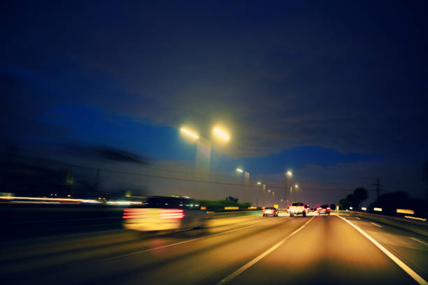 istock Driving at night on Miami Palmetto 826 south direction 1299230176