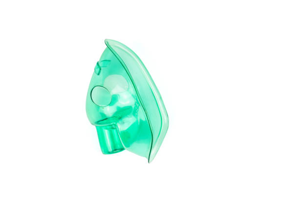 istock Green inhalation mask isolated on white background 1299232564
