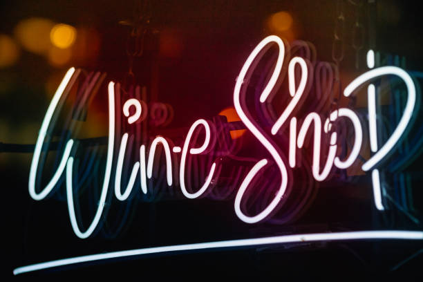 istock Glowing wine shop neon sign 1299234945