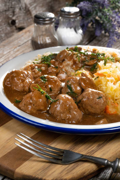 istock Minced meat balls in mushroom sauce. 1299235346